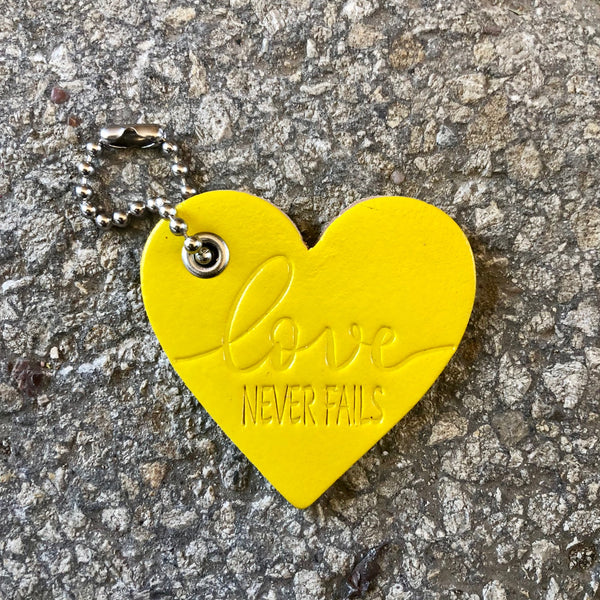 Love Never Fails Heart Bag Tag